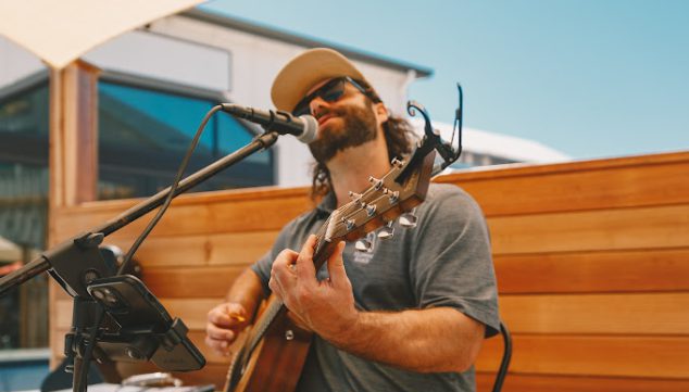 man playing guitar