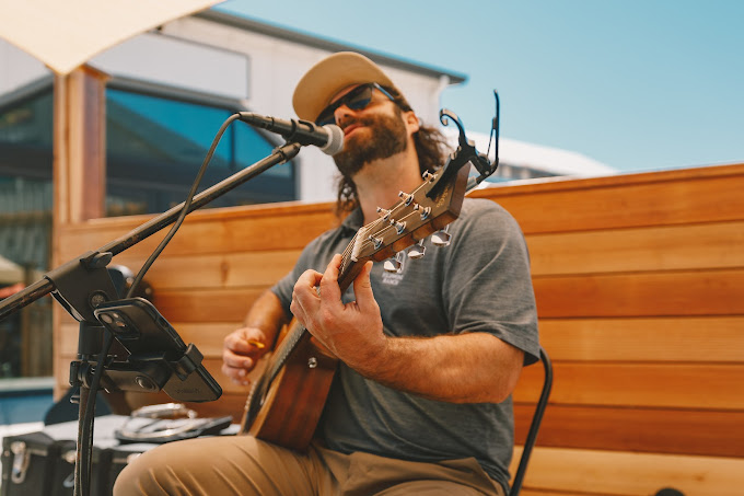 a singer with a guitar